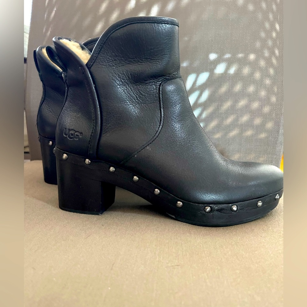 Ugg black leather booties with studs. Inside zipper. Size 9. Great condition.